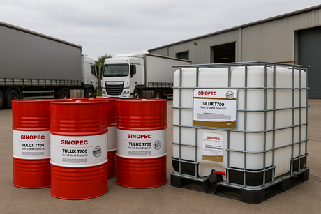 UK fleet depot with Sinopec Tulux T700 15W40 drums and IBC containers ready for delivery.